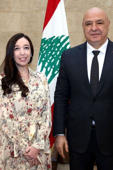 Lynn Zovighian & Lebanese President Joseph Aoun atthe Ba’abda Presidential Palace in front of Lebanese flag.