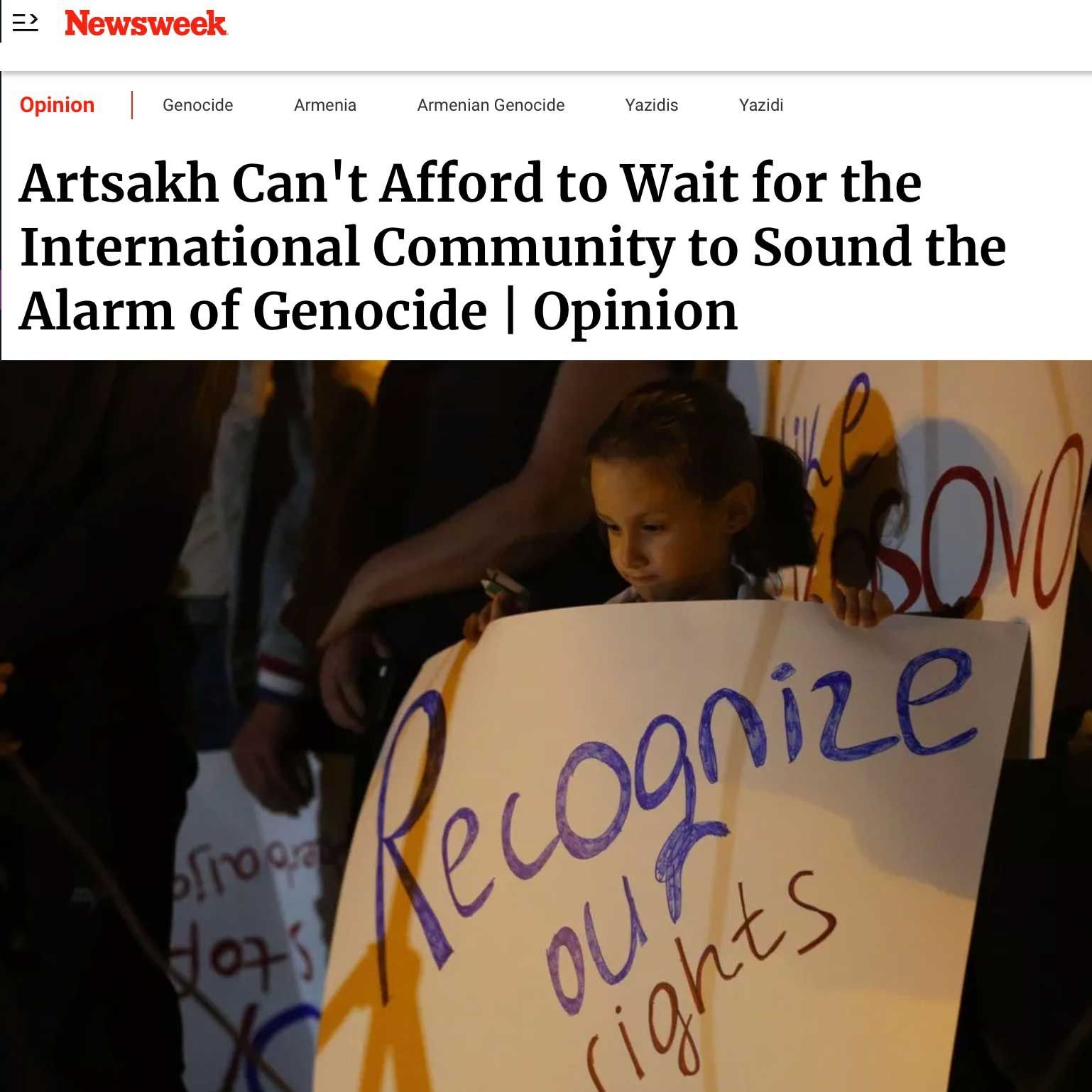 News week article about Artsakh: A child holds a sign reading