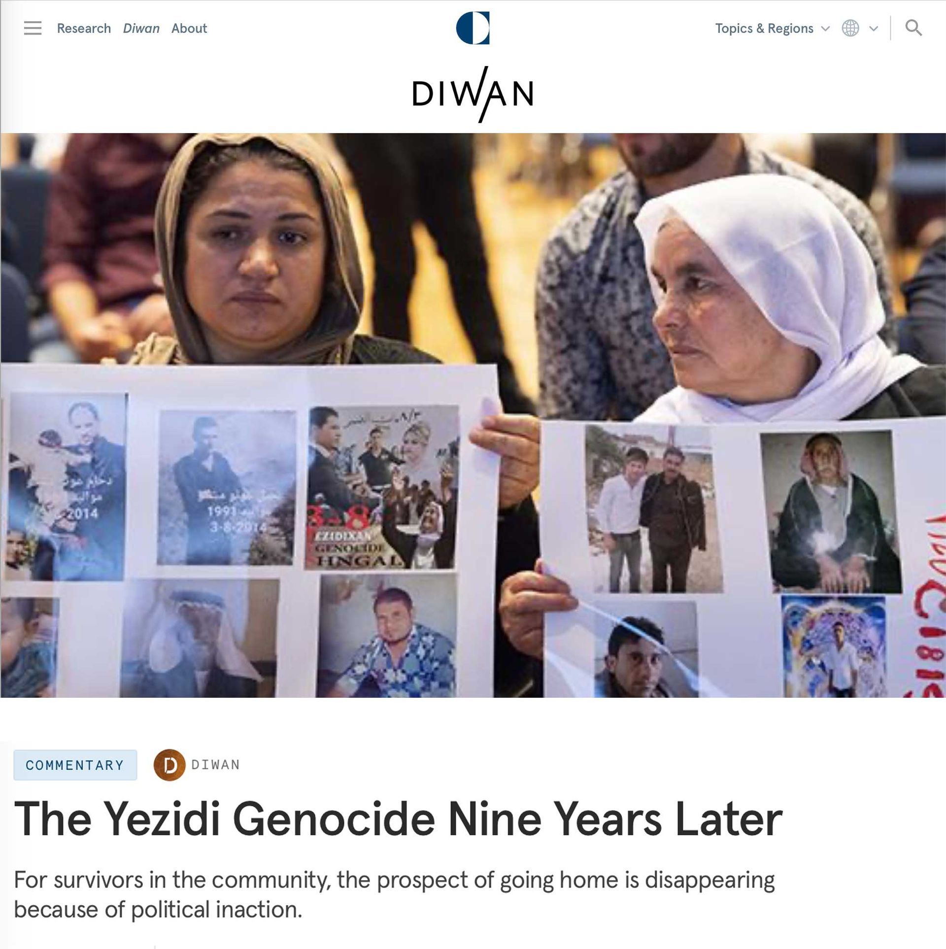 Diwan article; Two women wearing veils, holding photos, at an event titled