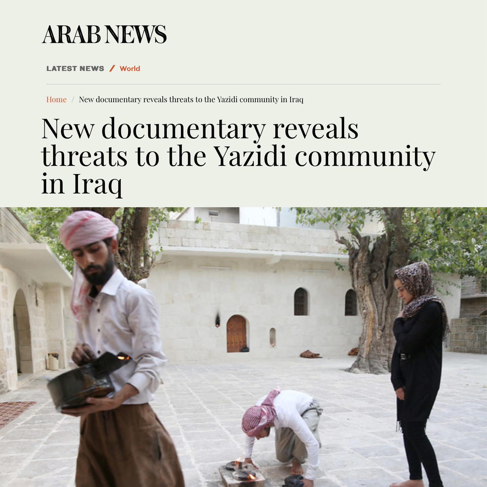 Arab News article titled “New documentary reveals threats to the Yazidi community in Iraq,” a man outdoors & a woman.