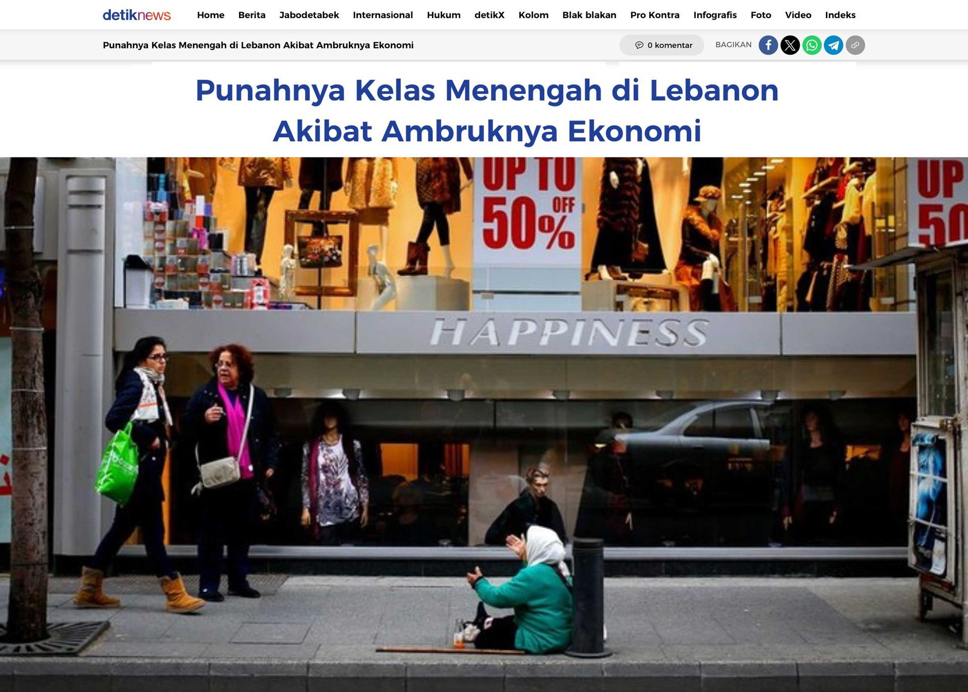 DetikNews Indonesia feature showing people walking past a “Happiness” storefront; headline about Lebanon’s crisis.