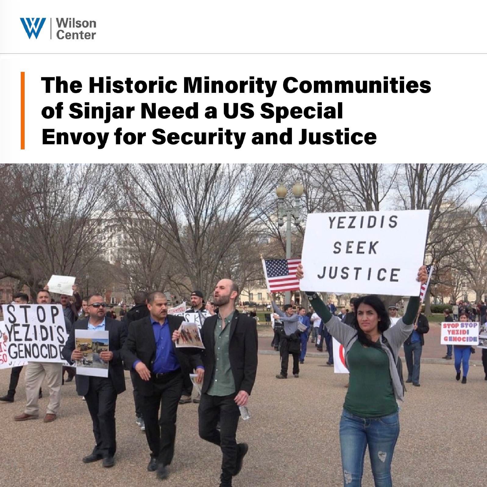 Wilson center article; People protesting in front of a building, holding signs that say