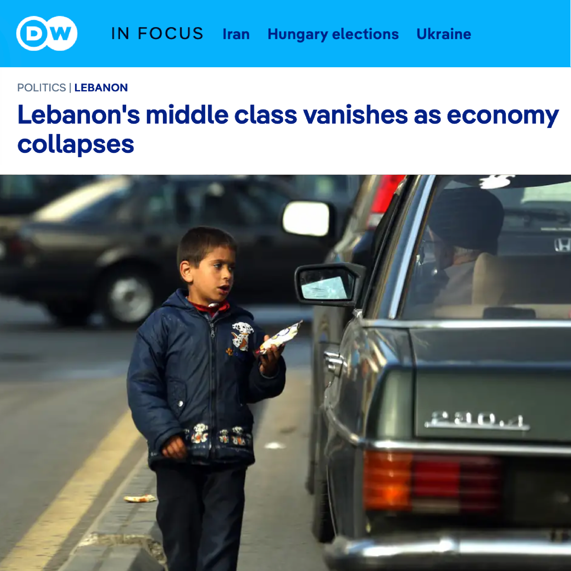 DW feature. Headline: Lebanon's middle class vanishes as economy collapses. Boy selling items to drivers on a road.
