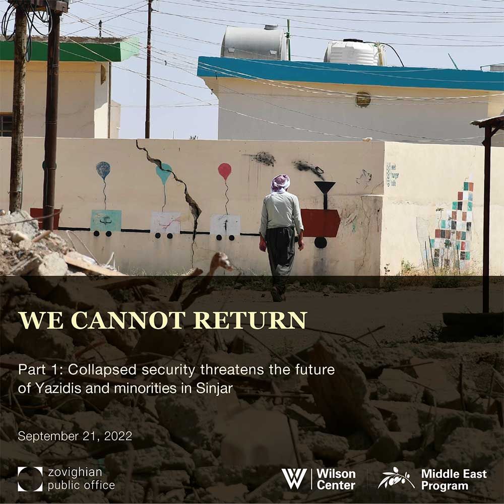 Policy Paper written by Yazda, the Wilson Center, ZPO & Middle East Program. Street scene with rubble, and a person walking.