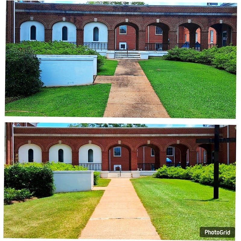 Split view of a brick cloister walkway with arched openings, green lawns, and a concrete path leading to a central door.