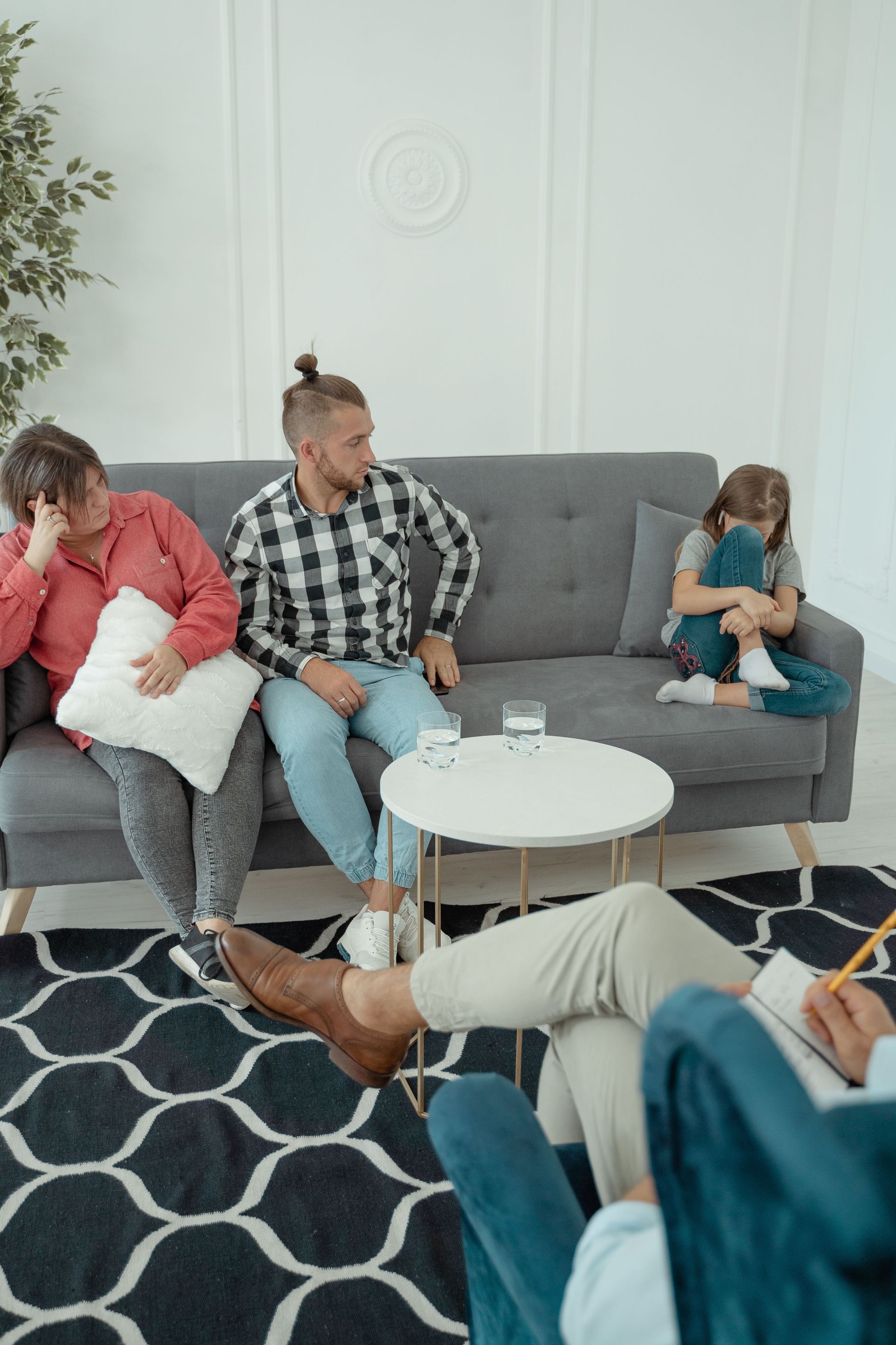 Parent and teen discussing an ADHD evaluation with a psychiatrist in Friendswood, TX