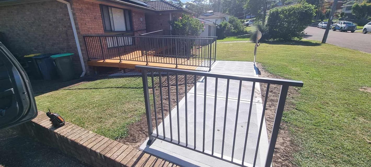 Stylised Dark Aluminium Ramp With Fence — Decorative Aluminium Works In Cardiff, NSW