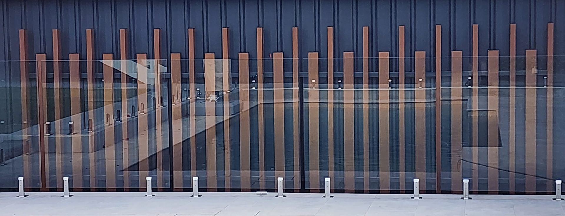 Close Up Of A Building With A Fence In Front — Decorative Aluminium Works In Cardiff, NSW