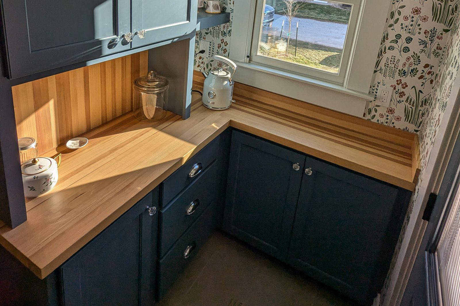 Reclaimed Douglas fir countertop with a herringbone corner and backsplash. Story City, Iowa.