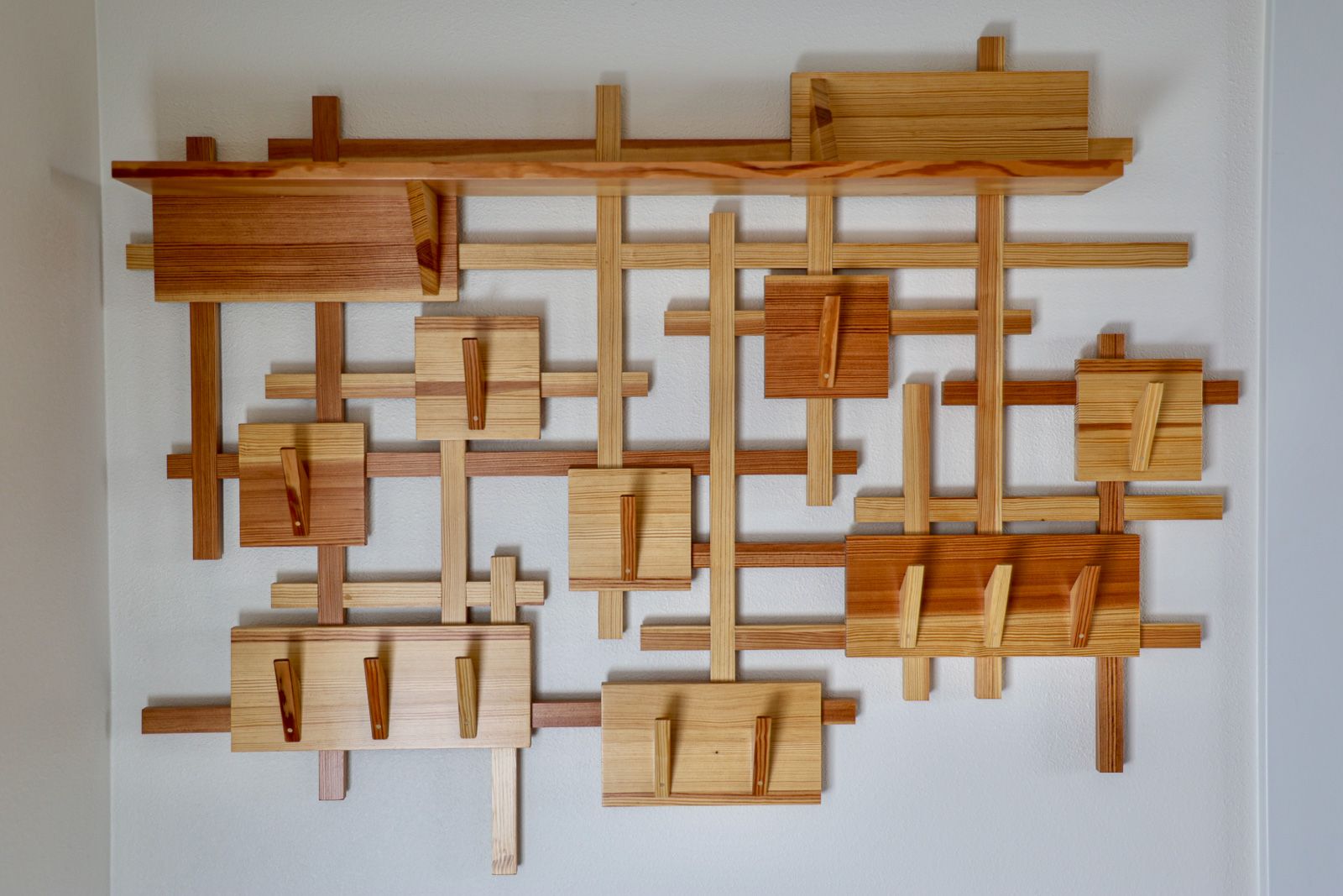 Straight on view of the Stagger coat rack in reclaimed Douglas fir, Story City, Iowa