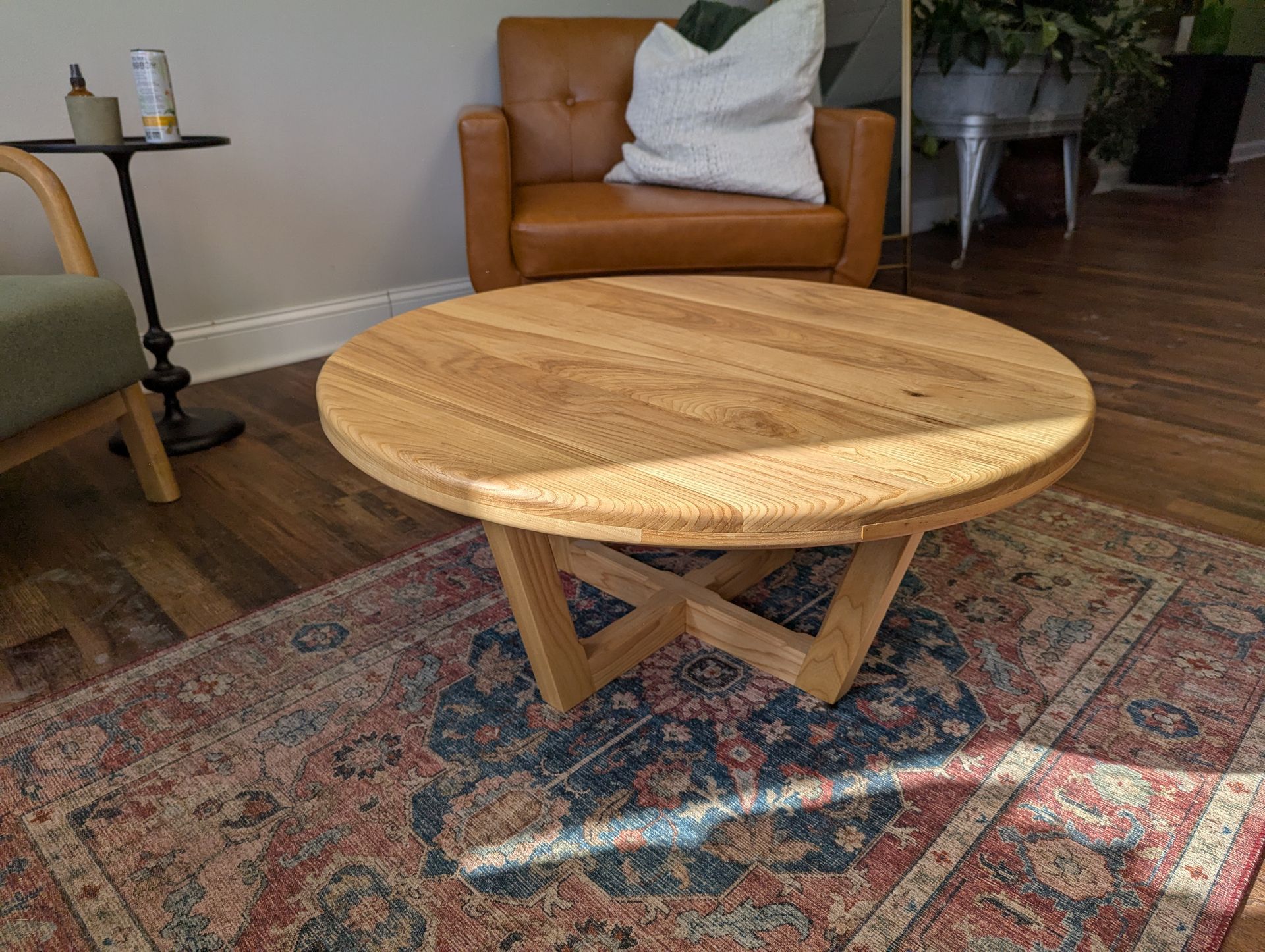 Minimalist solid ash coffee table showcasing natural wood grain and artisan craftsmanship.
