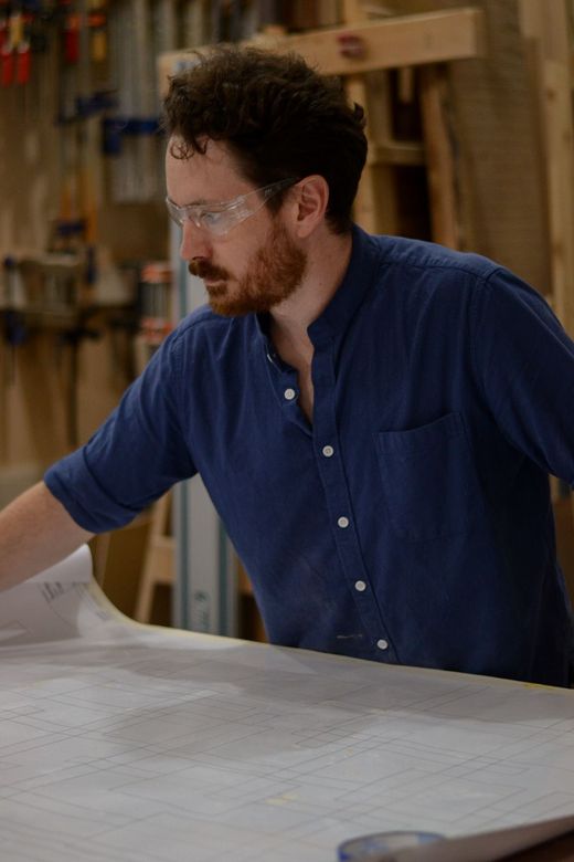 Jonas Christian working at the drawing bench in the Crow and Timber shop in Nevada, Iowa