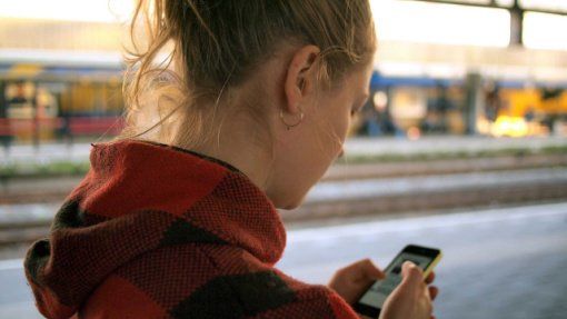 mobility usability testing woman on cell phone outdoors