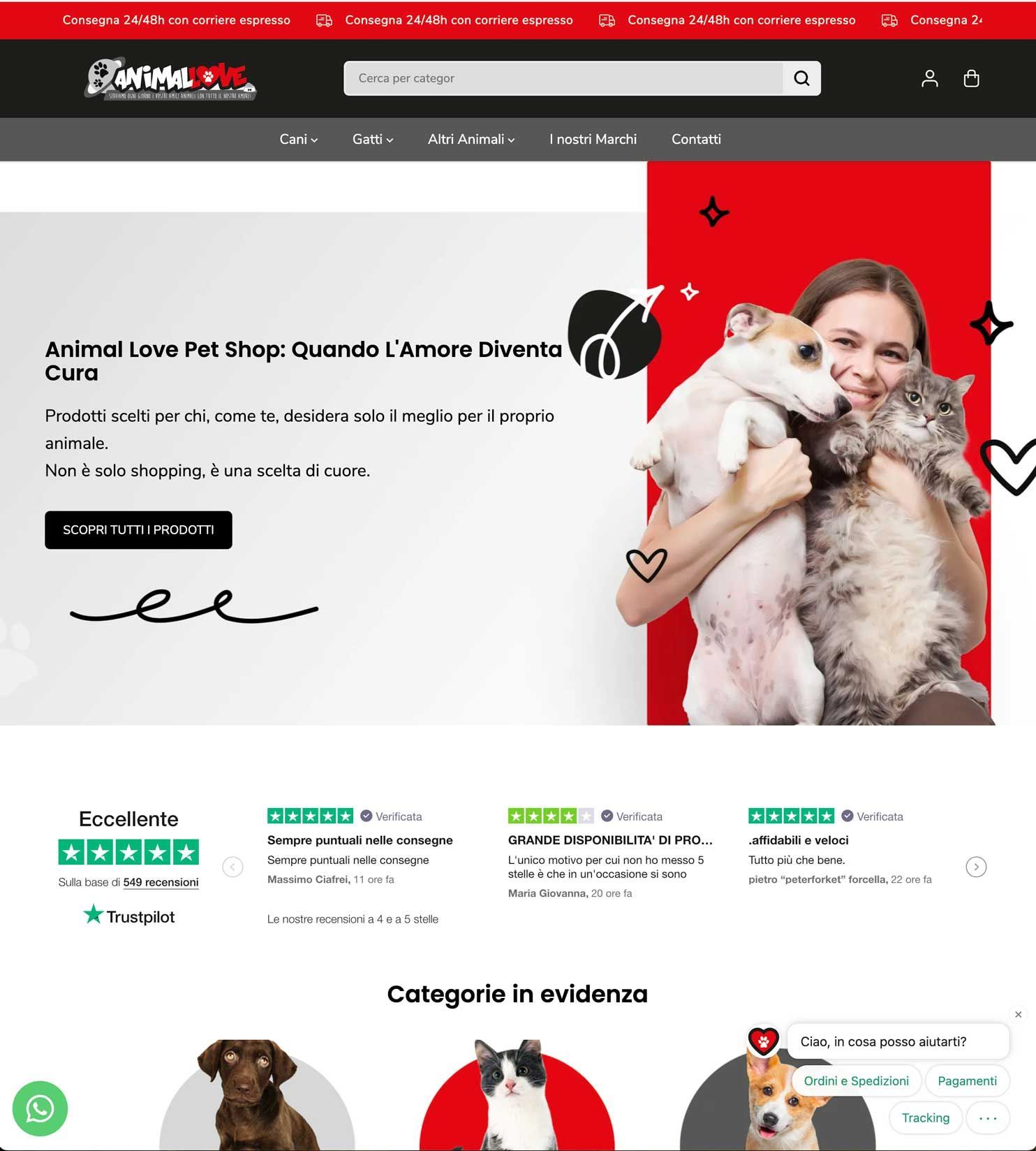Una donna tiene in braccio un cane e un gatto su un sito web.
