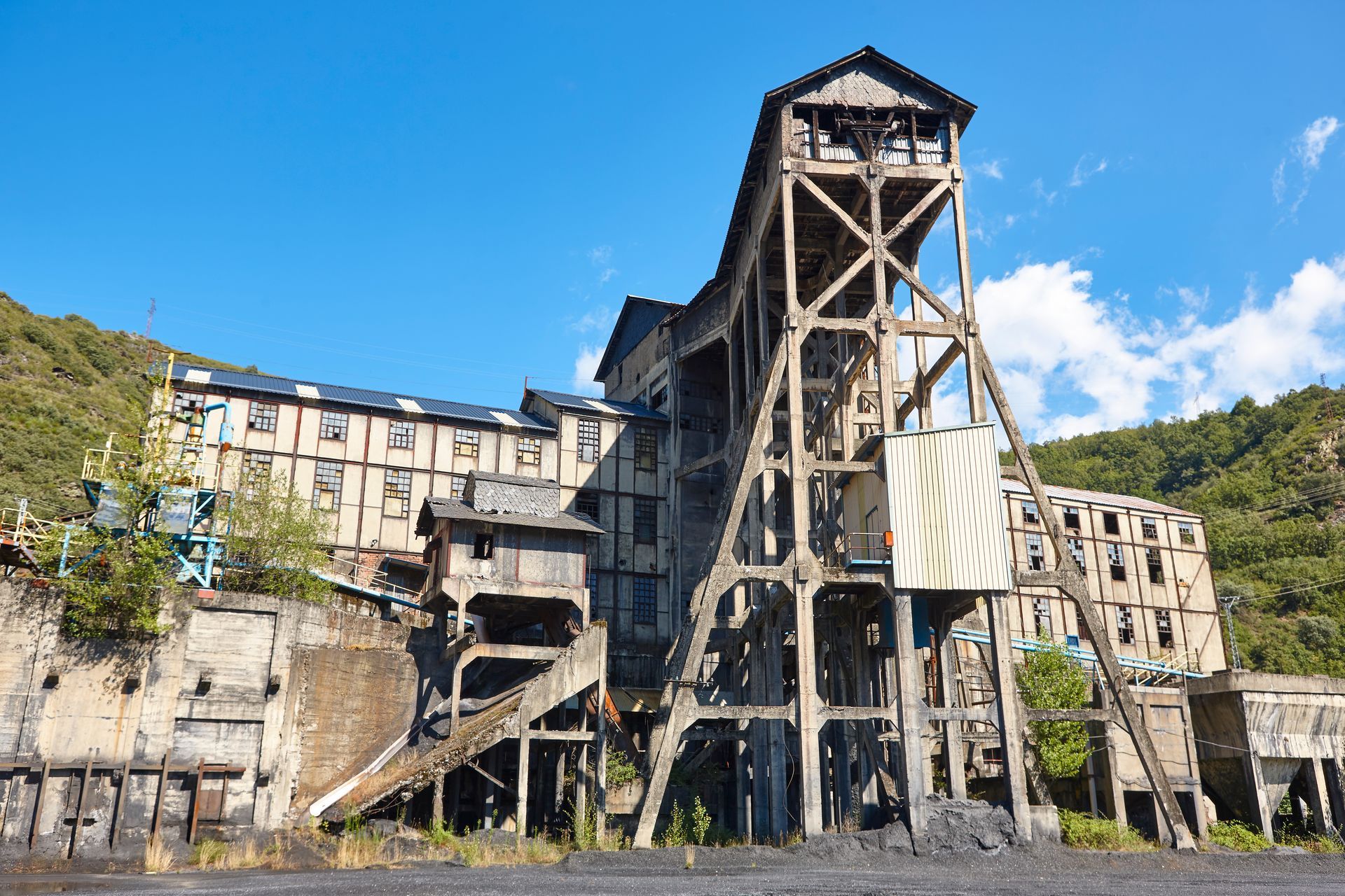 Abandoned industrial site requiring environmental assessment, cleanup, and compliant site closure