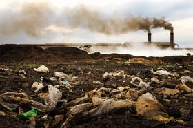 Industrial waste accumulation at manufacturing plant requiring regulated waste disposal