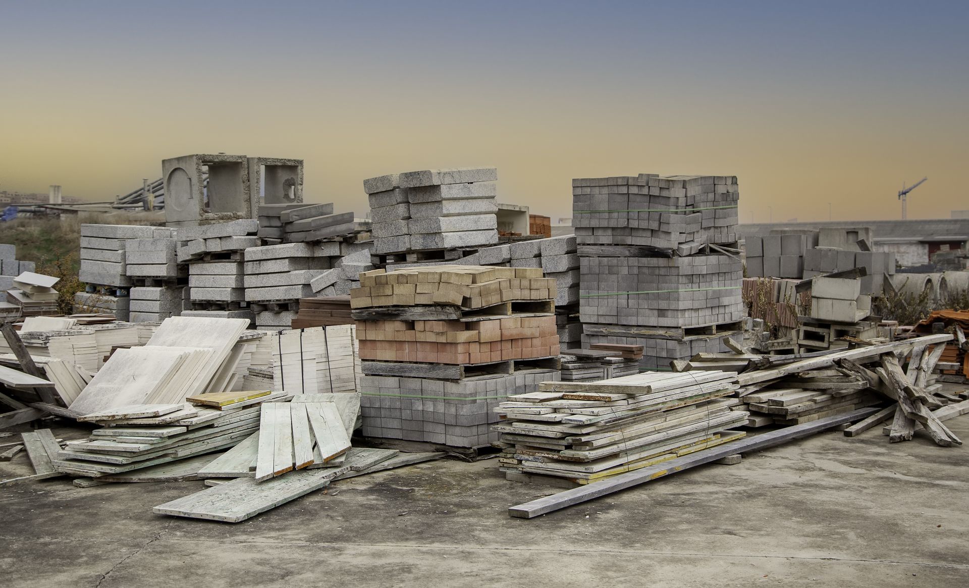 Abandoned pharmaceutical waste materials and construction debris staged at a contaminated industrial site