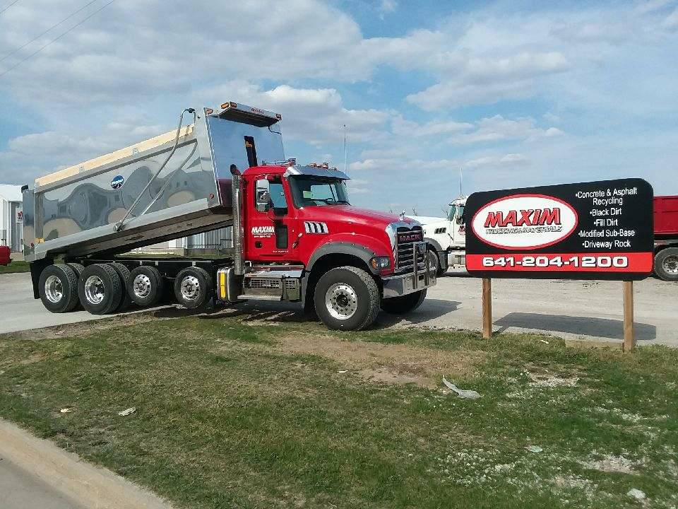 Dump Truck Unloading The Sand — Des Moines, IA — Maxim Trucking & Materials Dump Truck Unloading The Sand — Des Moines, IA — Maxim Trucking & Materials