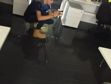 guy doing a cleaning solution in a residential