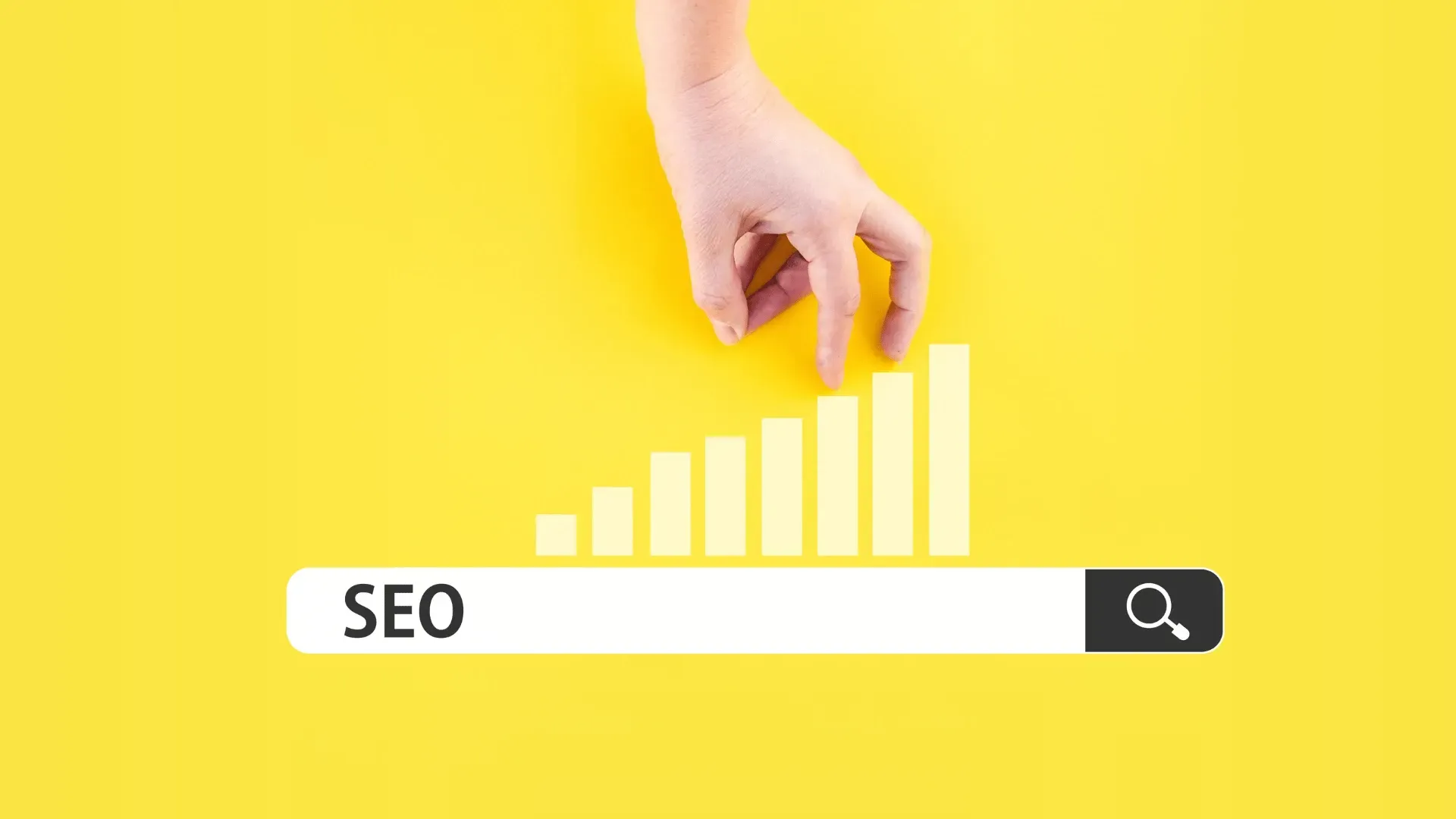 A hand is reaching for a bar with the word seo on it.