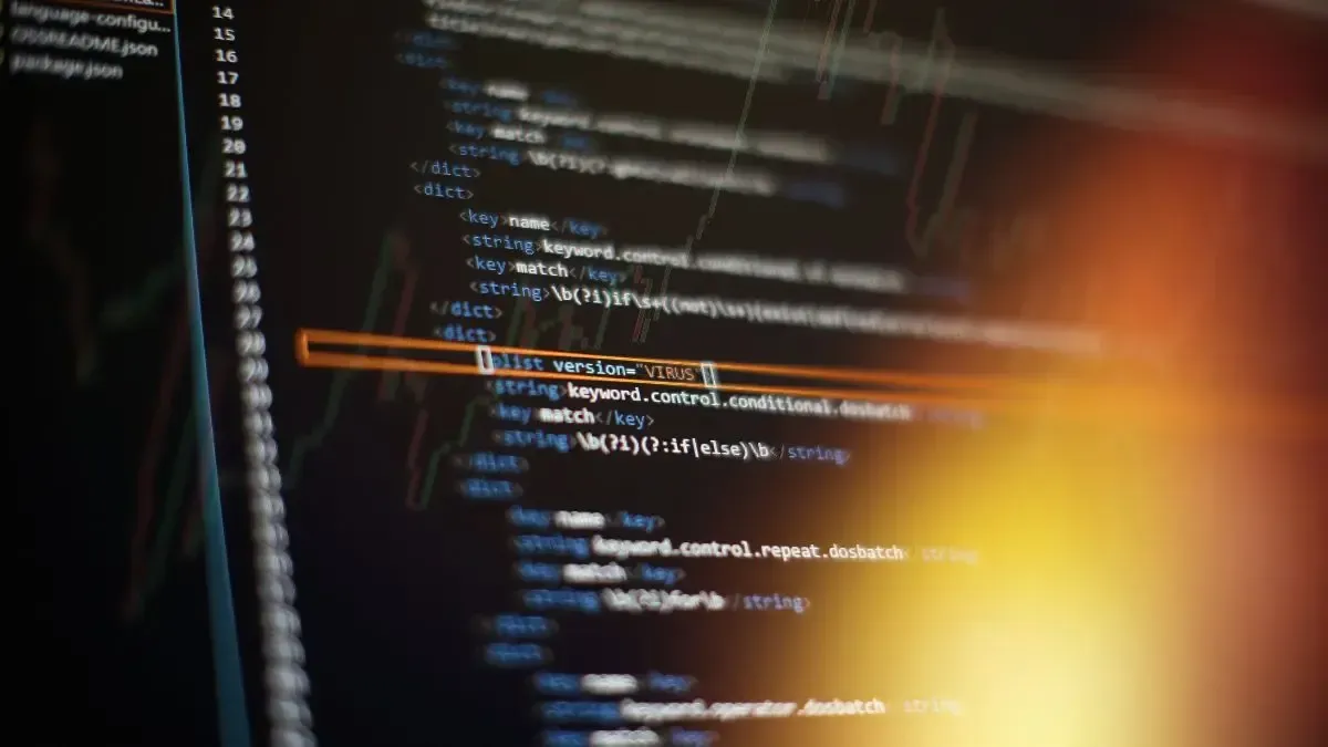 A close up of a computer screen with a lot of code on it.