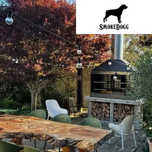 A picture of a backyard with a smokedogg logo