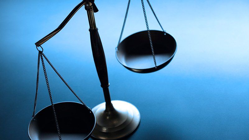 Justice Scale with blue background