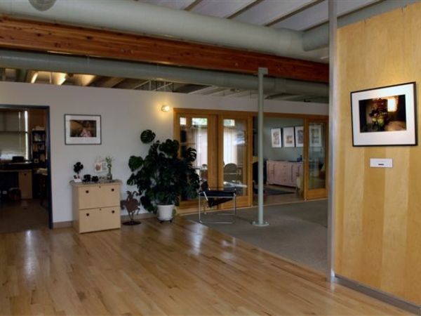 A room with a picture on the wall that says bbc