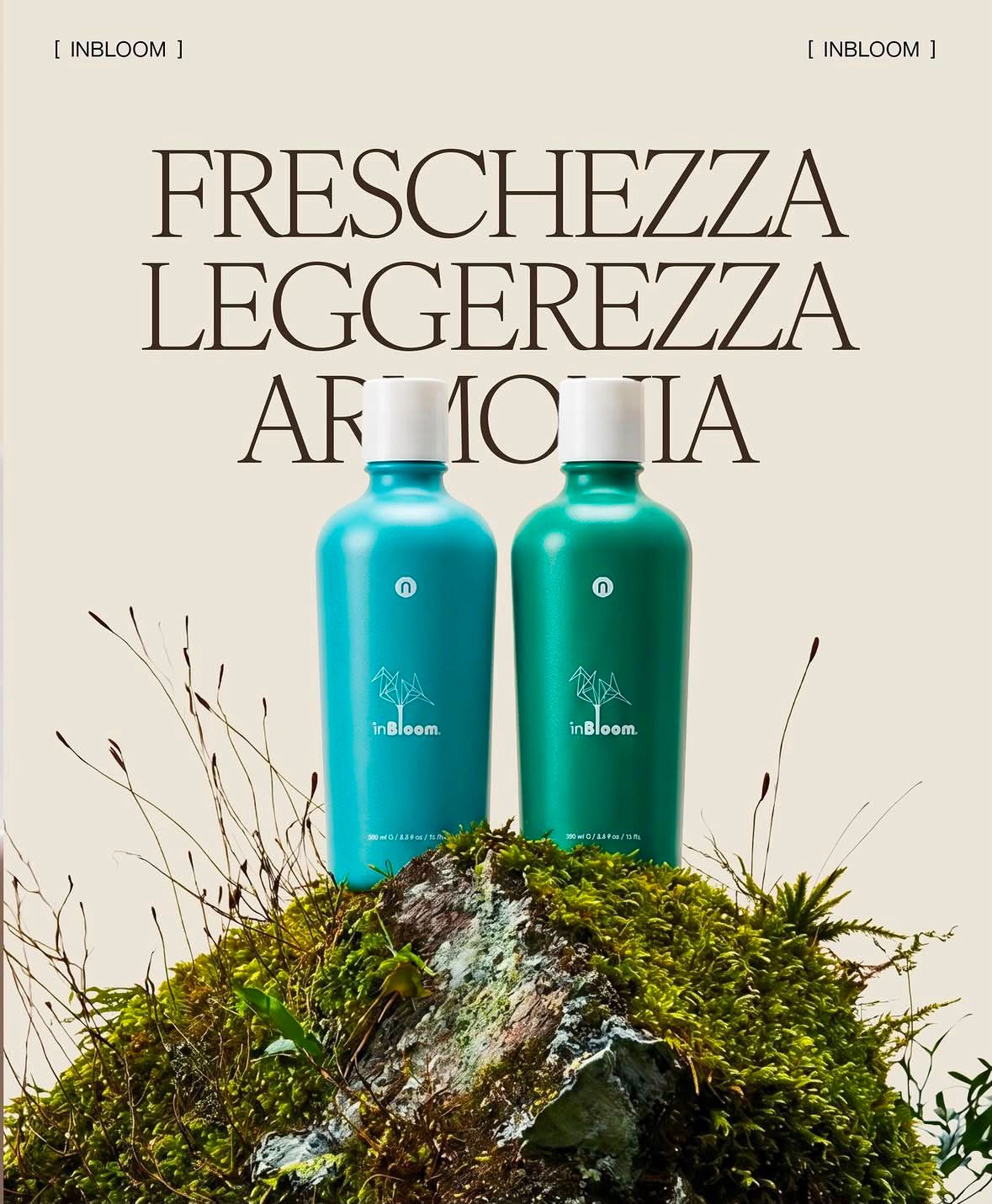 Two turquoise shampoo bottles on moss under “FRESCHEZZA LEGGEREZZA ARMONIA” text