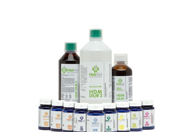 Flaconi e barattoli di integratori alimentari Hairaid indicati per la prevenzione della caduta dei capelli.