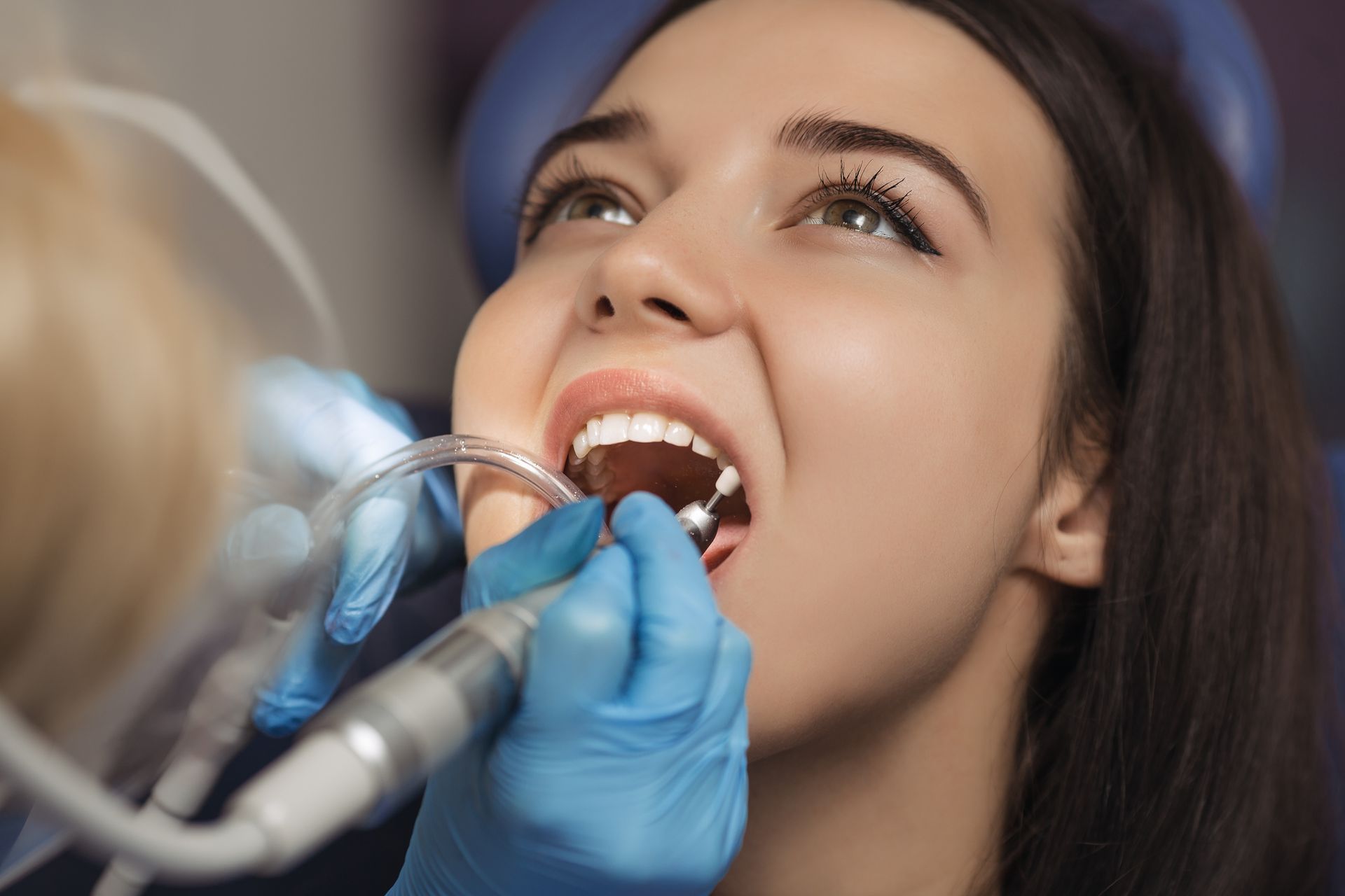 Dentist Check the Teeth of the Teenager with Intraoral Camera - Charlotte, NC - Northlake Dentistry Dentist Check the Teeth of the Teenager with Intraoral Camera - Charlotte, NC - Northlake Dentistry