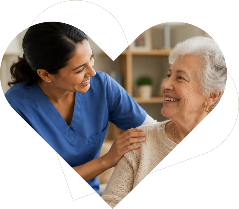 Caregiver comforting an elderly resident in a compassionate care setting