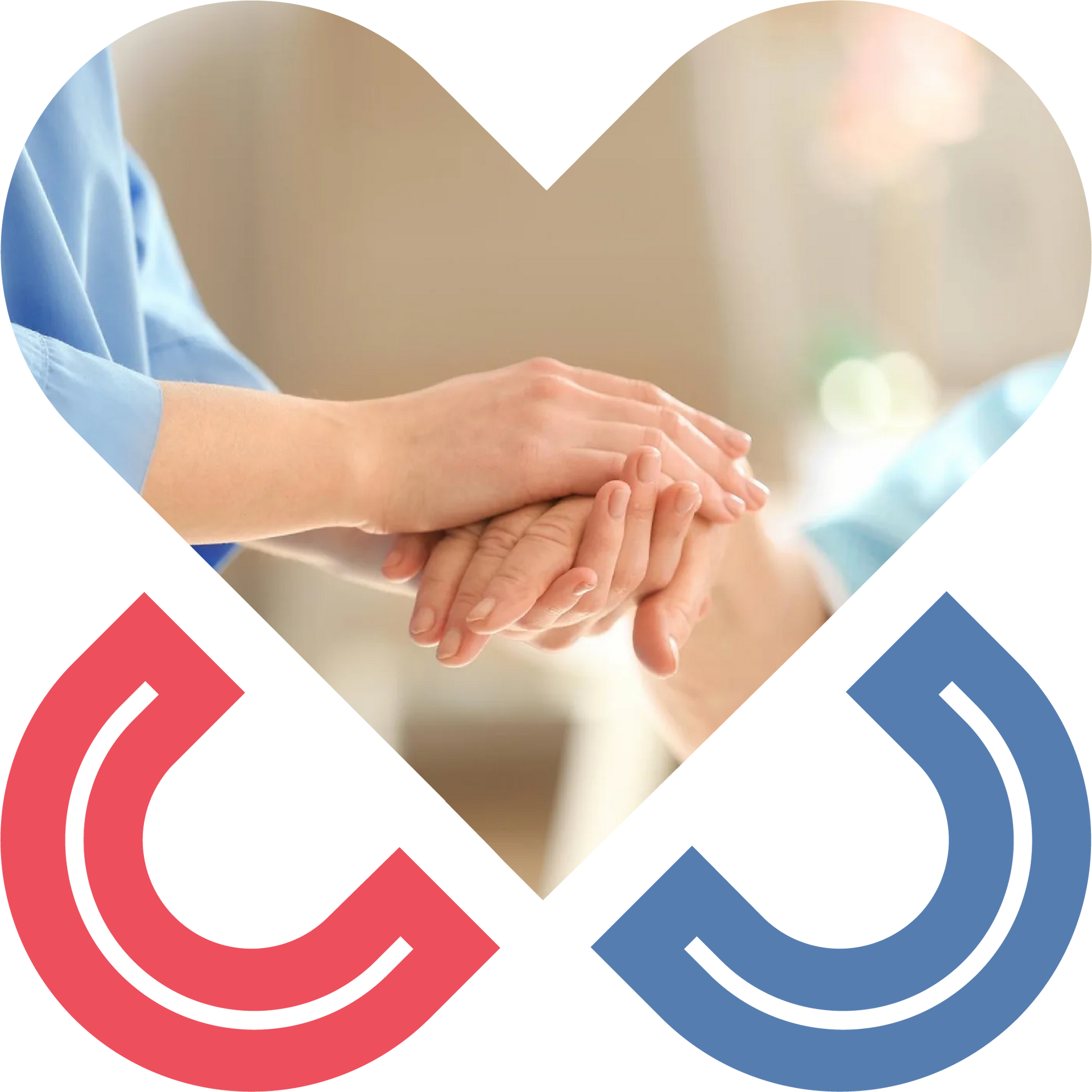 Caregiver holding a resident’s hands with compassion and support