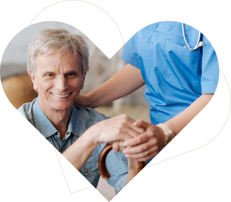 Caregiver supporting a senior resident with compassion