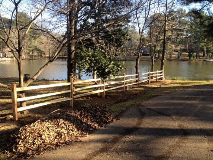 farm fence by lake