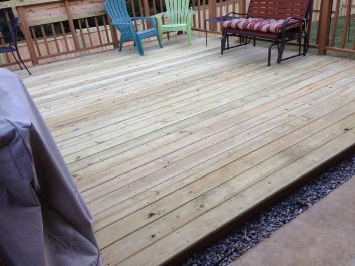 installation process of deck with multi colored chairs