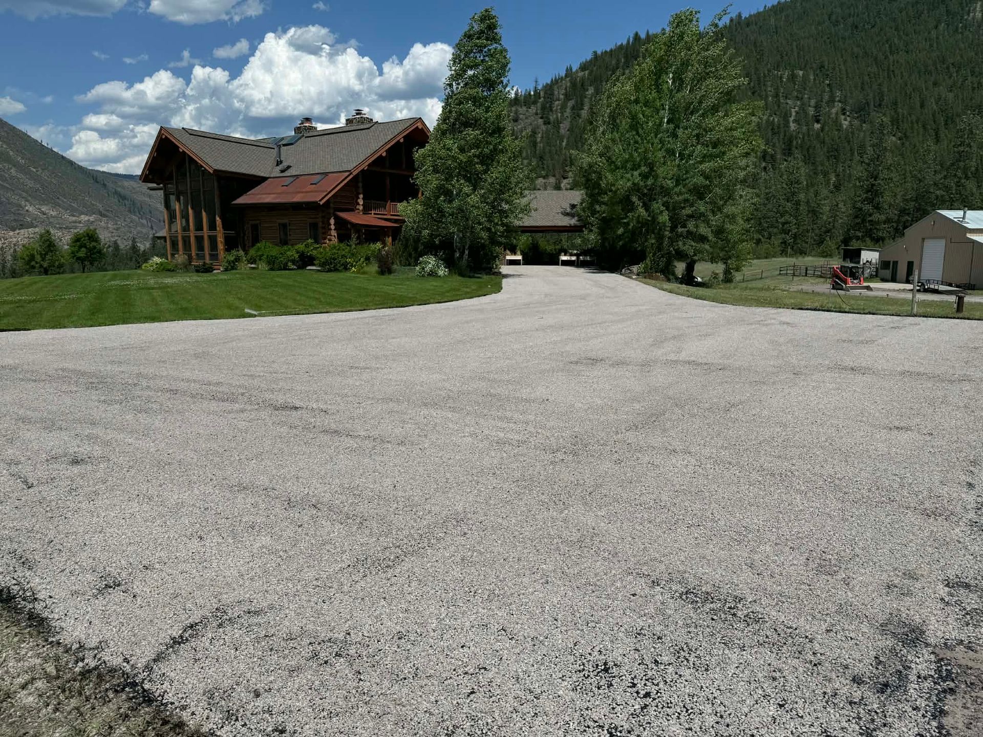 Large residential chip seal driveway and parking area installation in Great Falls, Montana