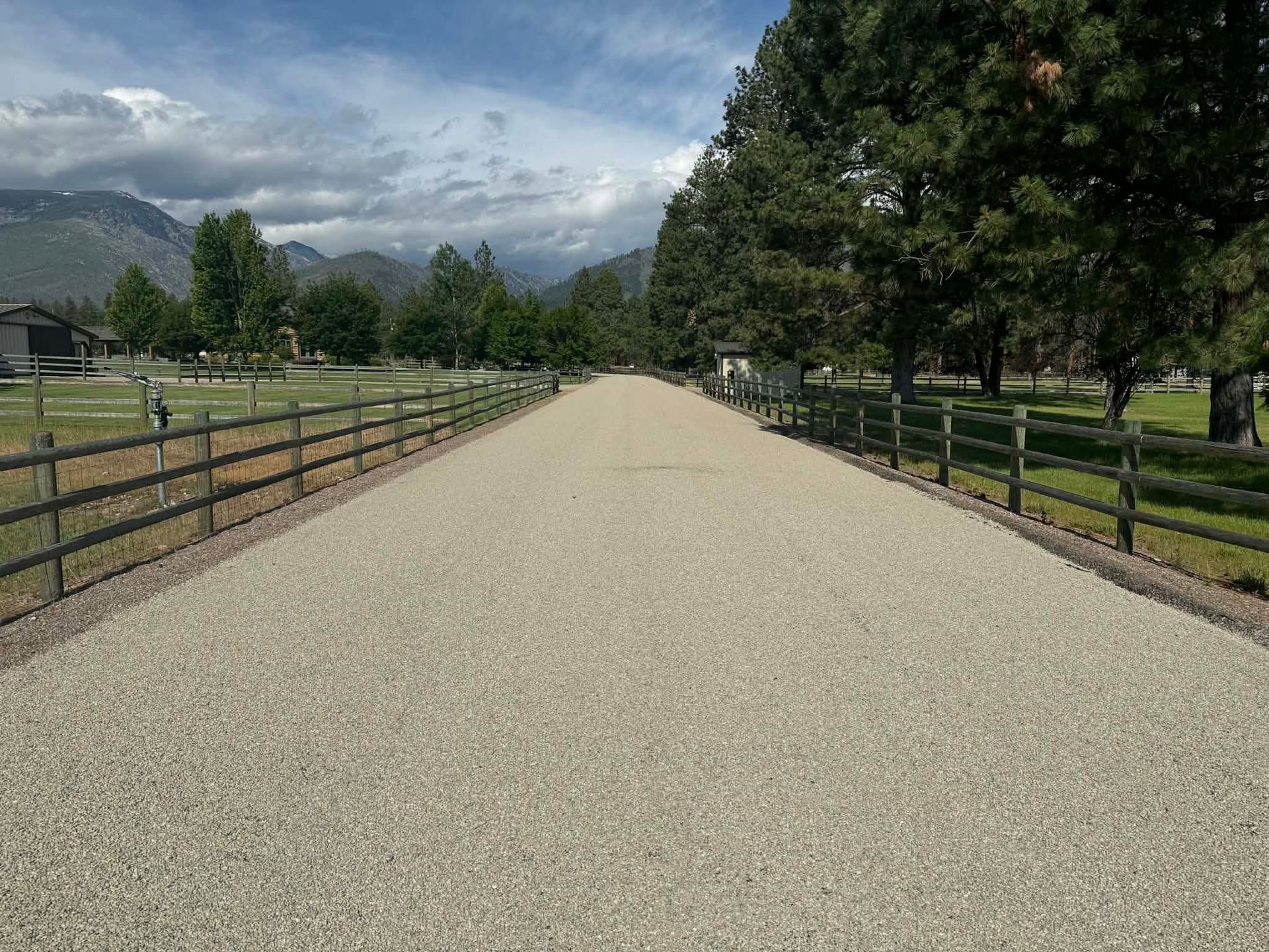 Professional chip seal driveway installation for a rural residential property in Great Falls, MT