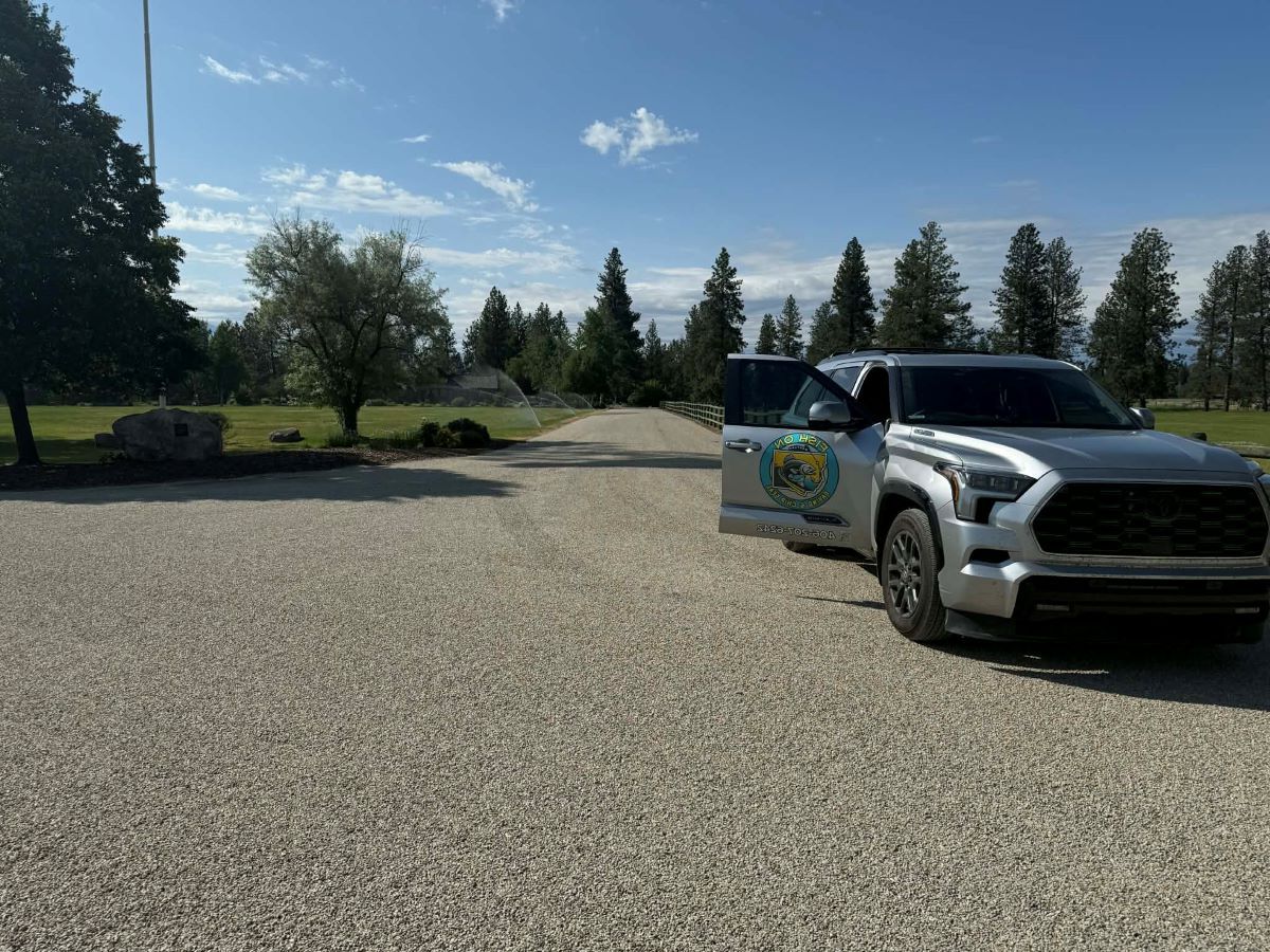 Fresh chip seal driveway paving on a rural residential road in Bozeman, Montana
