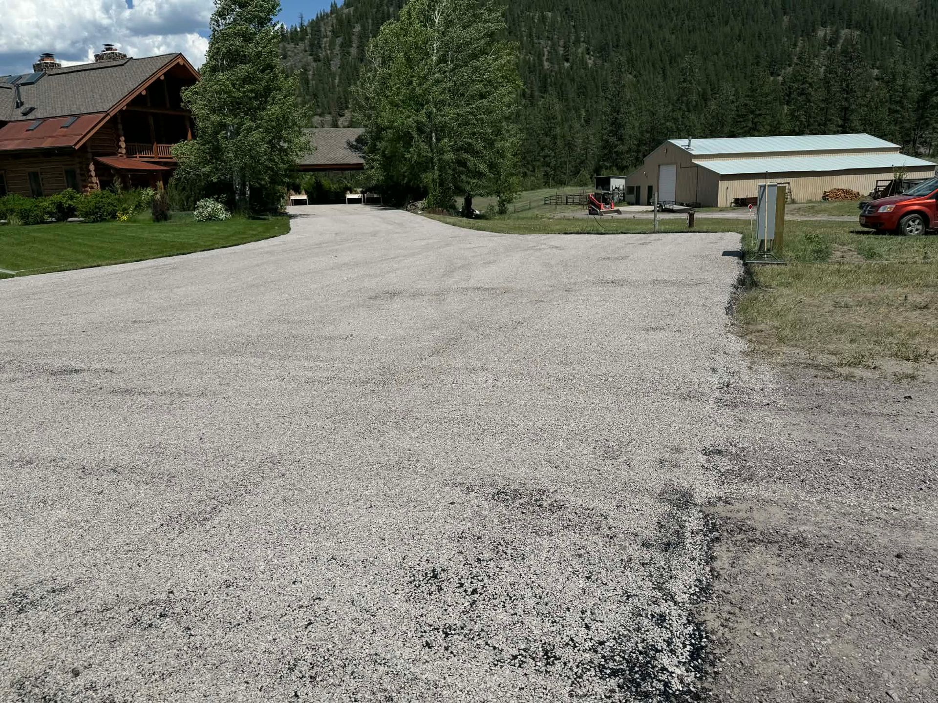 Wide residential chip seal driveway and parking area paving project in Great Falls, Montana