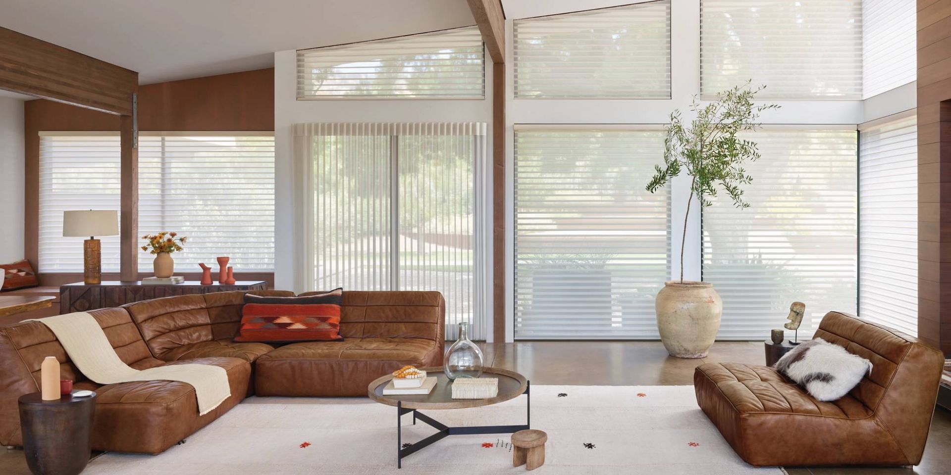 Hunter Douglas vertical sliding panels on windows and a sliding door, leading out to a patio