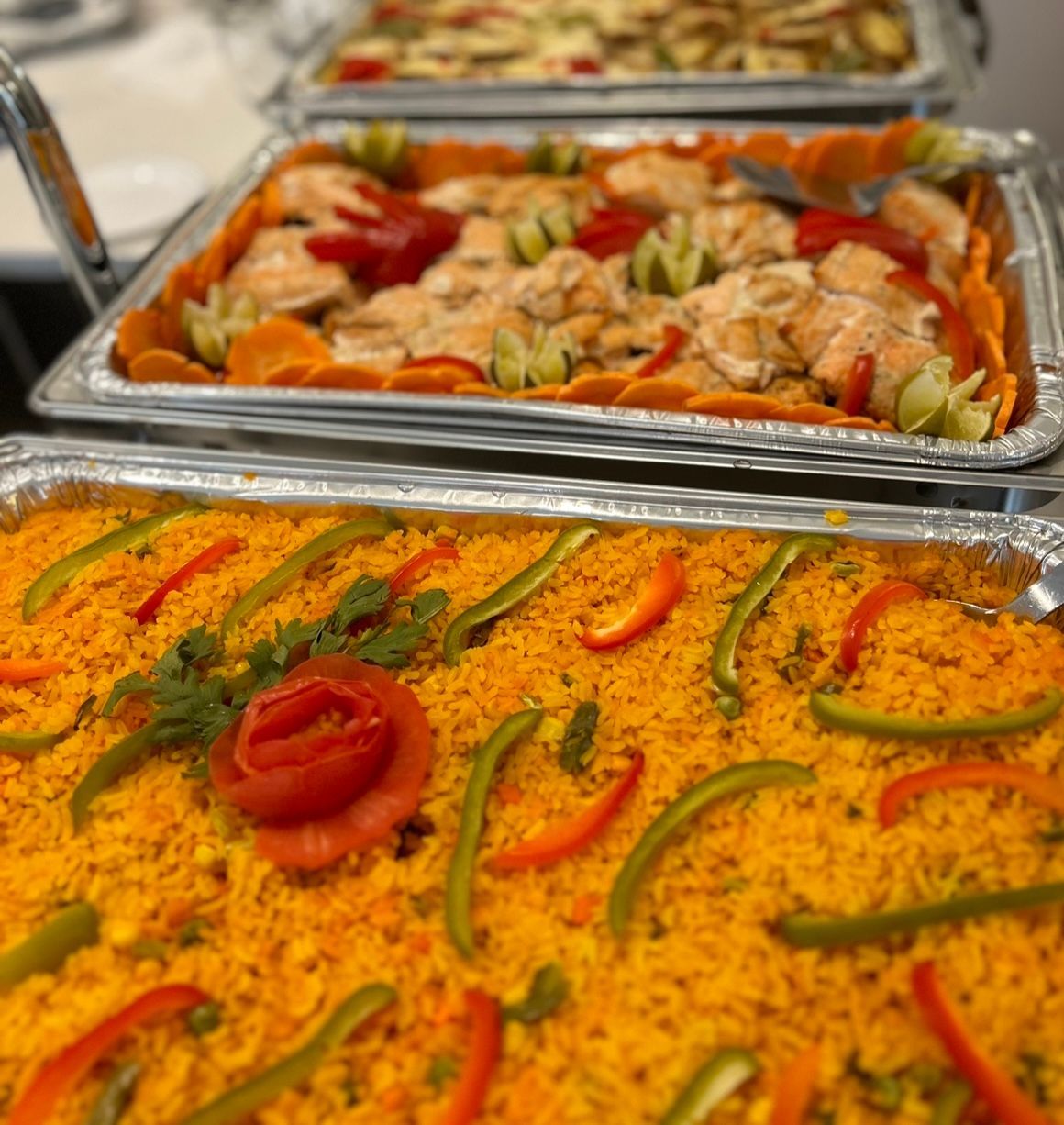 A plastic container filled with rice and beans on a table.