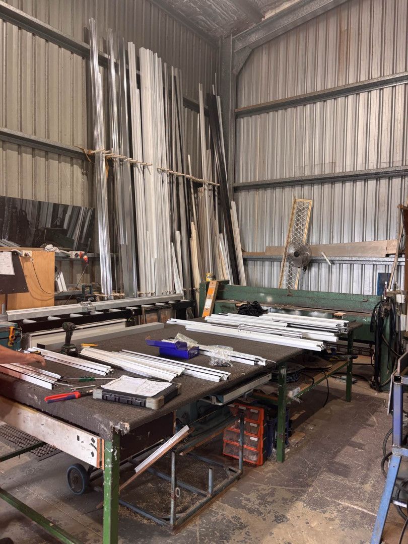 A Person is Cutting a Piece of Glass With a Pencil — Luffys Glass in South Murwillumbah, NSW