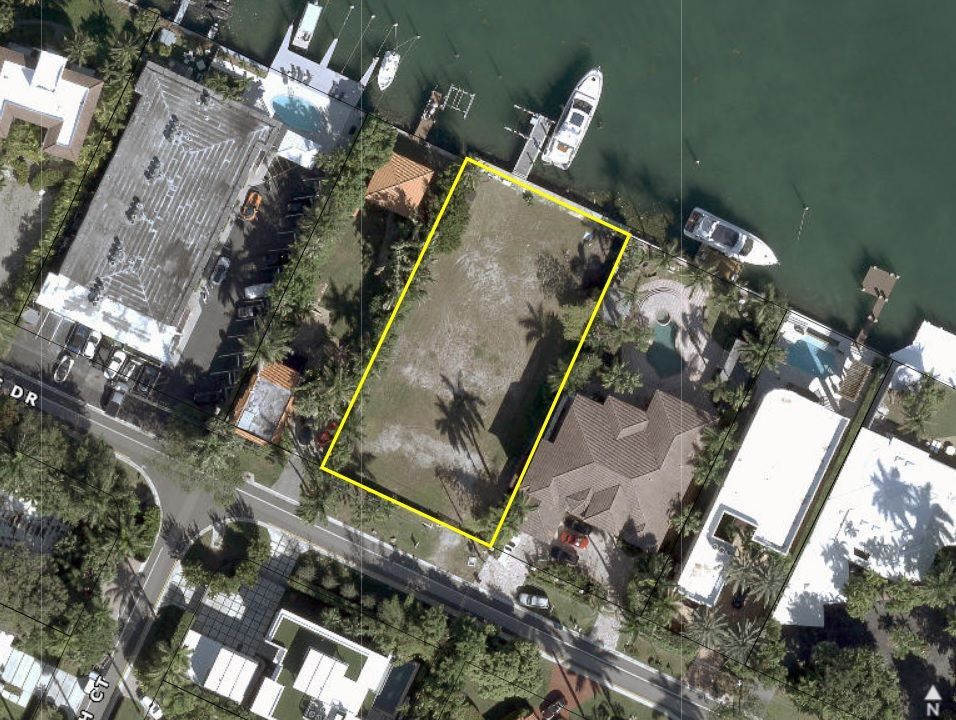 An aerial view of a house with a yellow outline around it