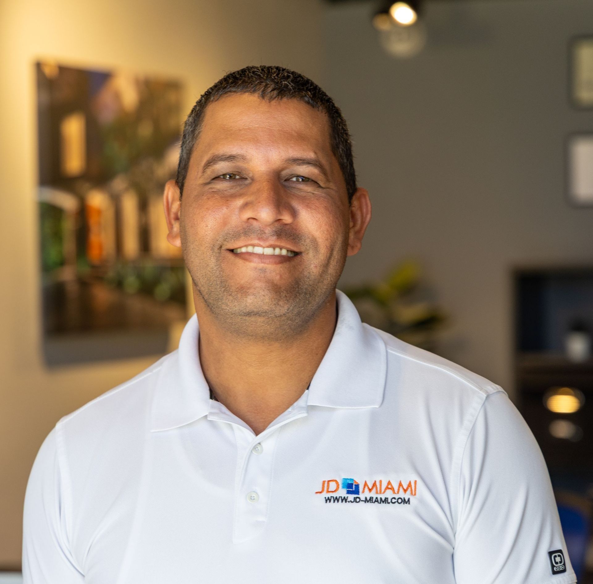 Man in white polo shirt with