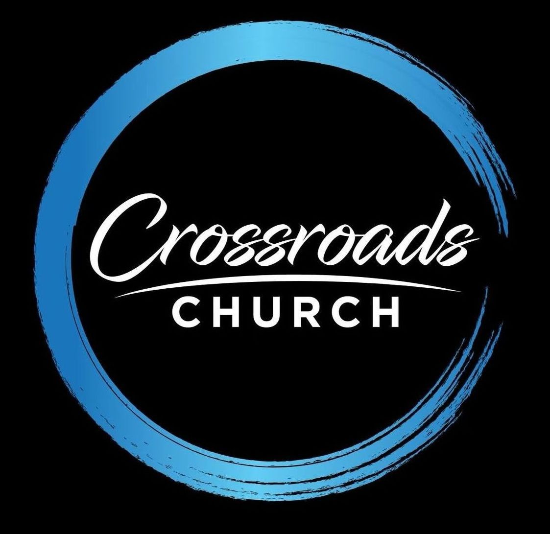 Crossroads Church logo: White script on black, framed by a blue brushstroke circle.