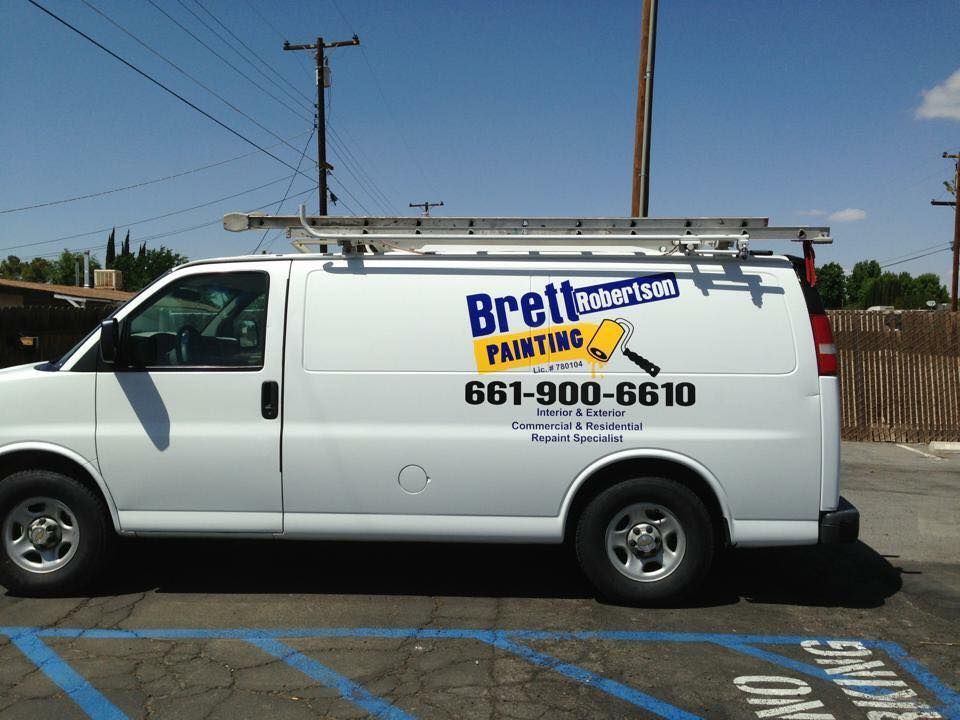 A van is parked in a parking lot