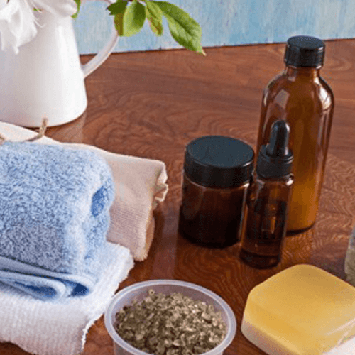 Spa supplies like a towel, oils, soap