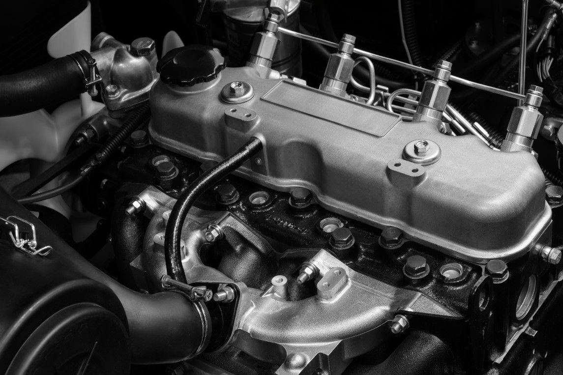 A Black and White Photo of a Car Engine — Drinnan's Diesel & Automotive Repairs In Gladstone Central, QLD