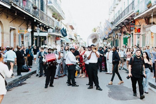 a band marching down the street in New Orleans